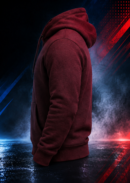 Side view of the Motovational zip-up hoodie in Burgundy with the hood down, showing the sleeve and ribbed cuff