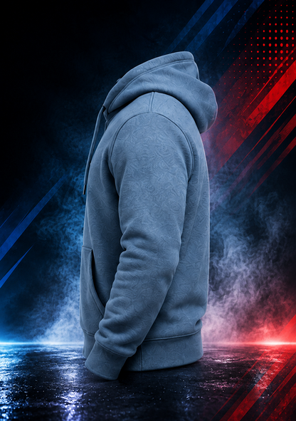 Side view of the Motovational zip-up hoodie in Steel Blue with the hood down, showing the sleeve and ribbed cuff