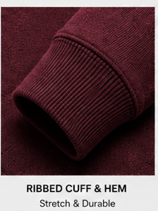 Close-up of the ribbed cuff and hem of the Motovational zip-up hoodie in Burgundy