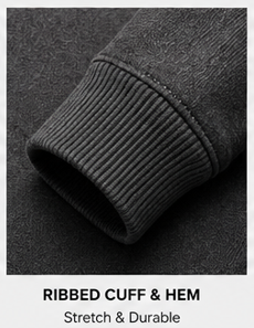 Close-up of the ribbed cuff and hem of the Motovational zip-up hoodie in Charcoal Grey